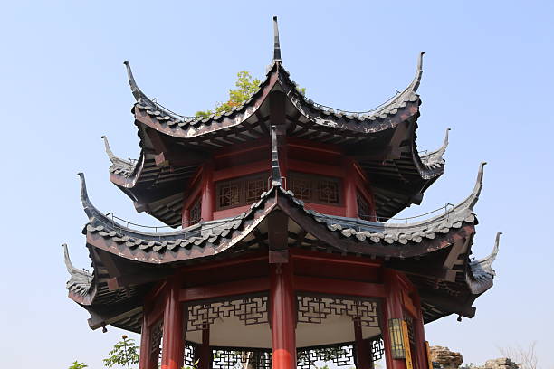 istock traditional chinese architecture, a classical pavilion-style building with a red and black roof and triangular eaves. 2253340417