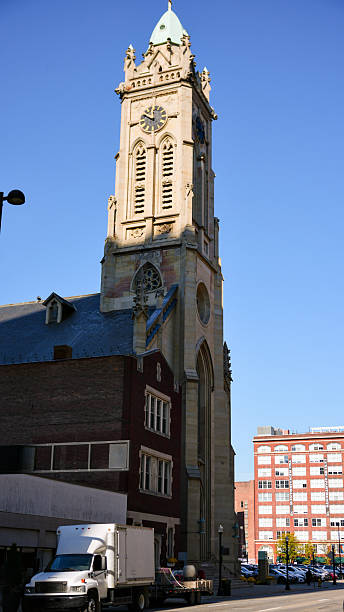 istock Historic clock tower building against blue sky in Cincinnati Ohio 2253342921