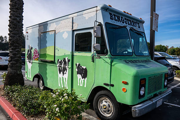 Santa Clarita, California- An old ice cream truck painted with the Ben & Jerry's theme parked outside its store