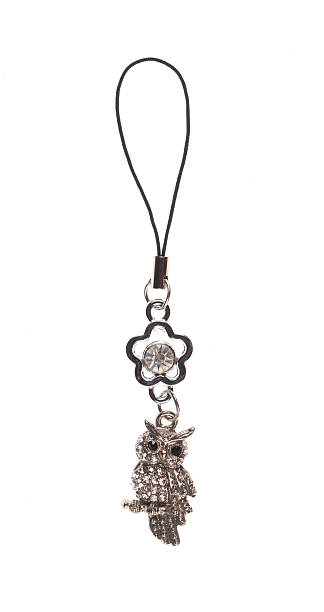 istock Metal owl pendant isolated on white background 2253351148