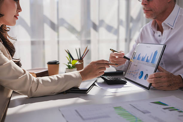 istock Business professionals analyzing financial data during meeting 2253355461
