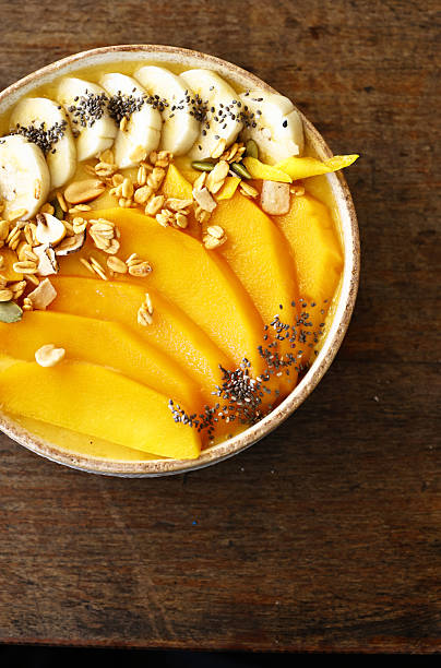 istock Smoothie bowl with fresh fruit and granola, healthy eating 2253356103