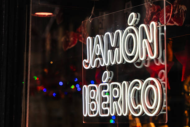 istock Jamon iberico neon sign on restaurant window in Barcelona 2253356760