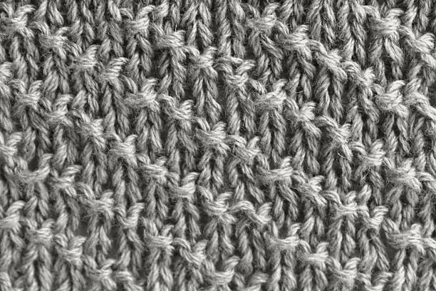 garter stitch knitting pattern. reuse of knitwear, T-shirts, second life of things, texture, background. Knitted background.