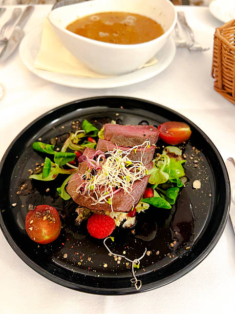 istock Slices of  beef on  salad 2253359064