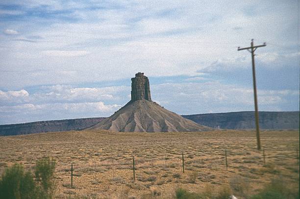 Colorado, USA, 1978. Chimney Rock in San Juan National Park, Colorado. Photograph taken from the interior of a passing car.