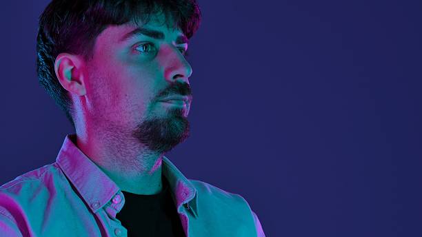 istock Profile of a Man with Neon Lighting Effect 2253363516