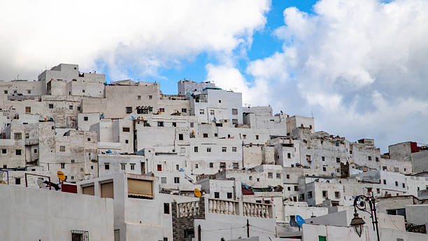 White houses stacked on a hillside in Tetouan