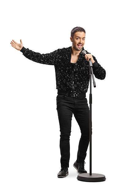 istock Male singer in a black sequin jacket performing with a microphone 2253374233