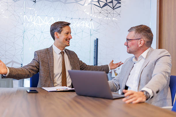 istock Business men discussing strategy during modern office meeting 2253375461