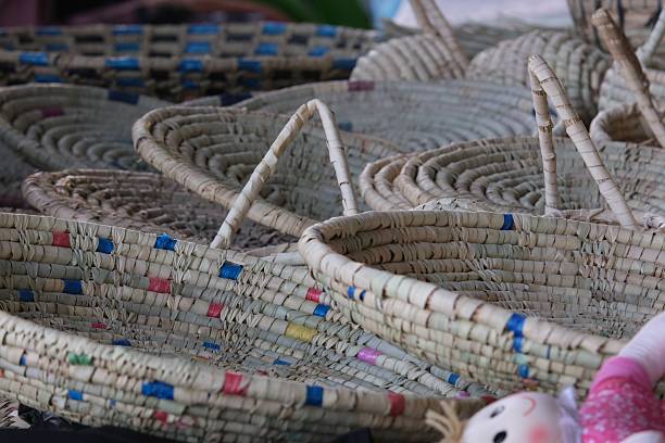 istock Colorful woven baskets in a market 2253376386