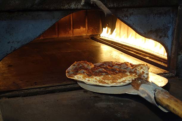 istock Freshly baked flatbread from traditional oven 2253376632