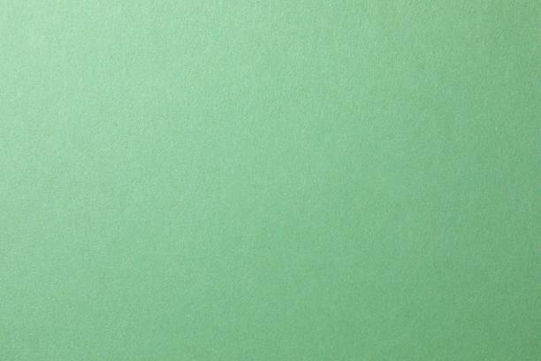 istock Green paper texture or background for design with copy space for text or image 2253376668