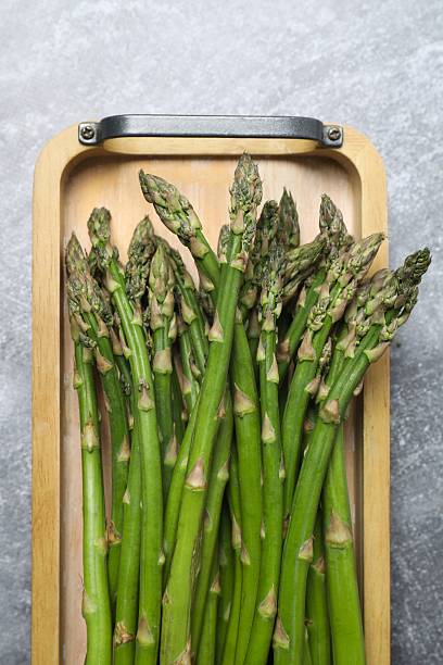 istock Fresh green asparagus on the table 2253376689