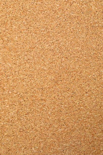istock Cork background. Brown yellow color textured cork board background. Natural cork texture. Top view background. High resolution photo. Full depth of field. 2253377347