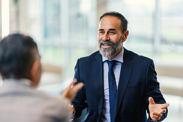 istock Senior businessman having professional discussion with colleague 2253378621