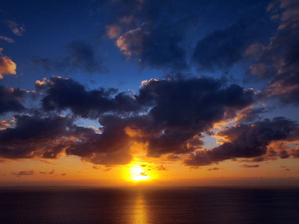 Sunrise in the Florida Keys with dramatic and colorful clouds create amazing stock drone photos over the Atlantic Ocean.