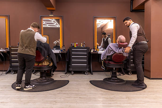 istock Customers at a busy Turkish barber 2253383602