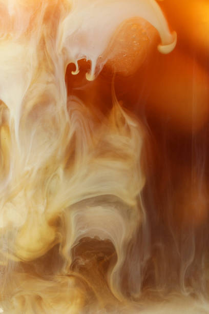 istock Refreshing coffee with ice and milk as background, closeup 2253385016