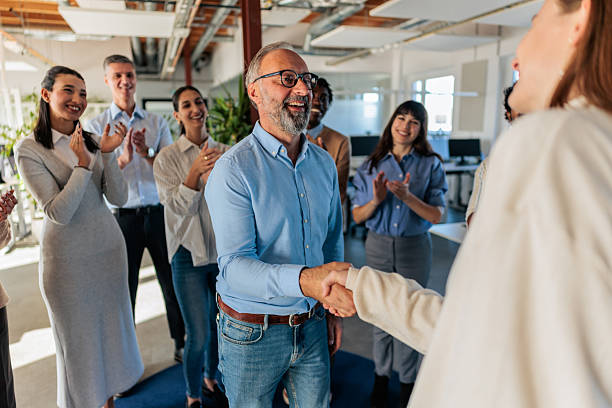 istock Employee Recognition Moment in a Modern Office 2253390548