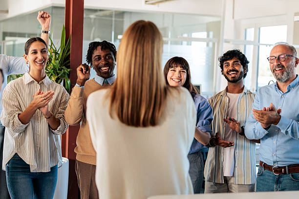 istock Colleagues Celebrating Success in the Office 2253392212