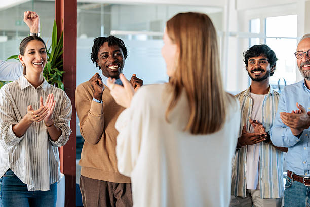 istock Colleagues Celebrating Success in the Office 2253392226