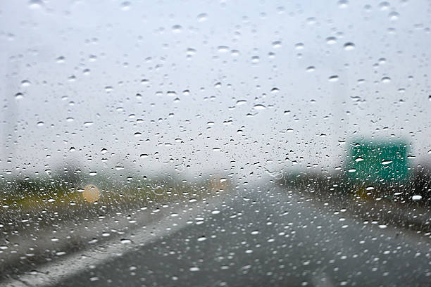 istock driving on a rainy day 2253394153