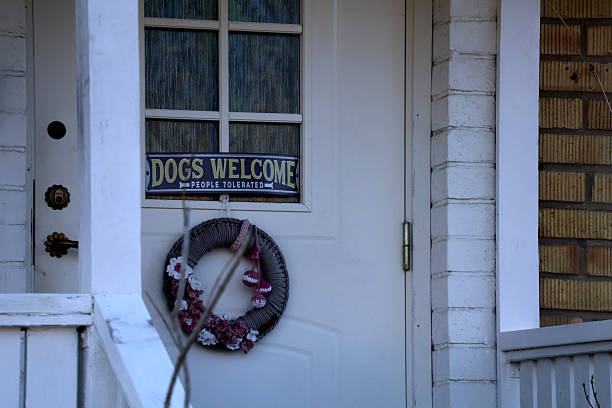 istock A sign saying : dogs welcomed - people tolerated 2253398162
