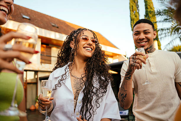 istock Friends celebrating at a pool party, dancing and having a great time. 2253406482