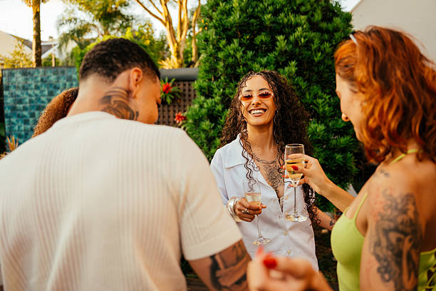 istock Friends celebrating at a pool party, dancing and having a great time. 2253406829