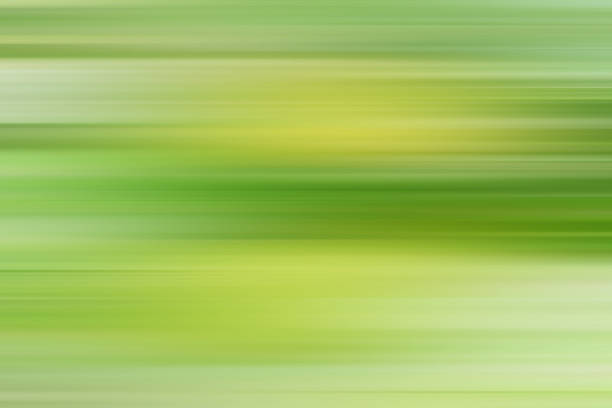 Green modern abstract background with green glowing movement and high-speed