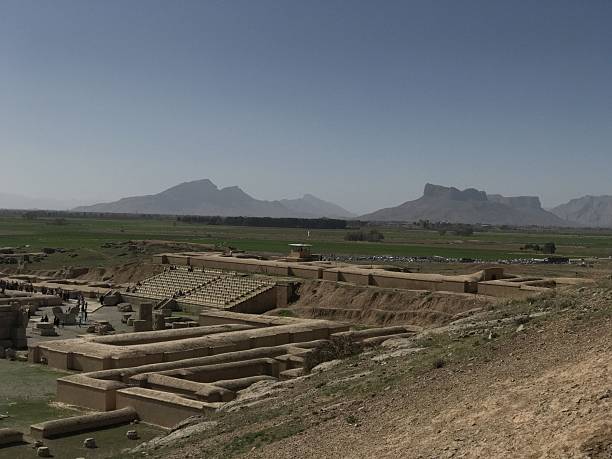 istock Panoramic view of ancient ruins with mountains 2253407319