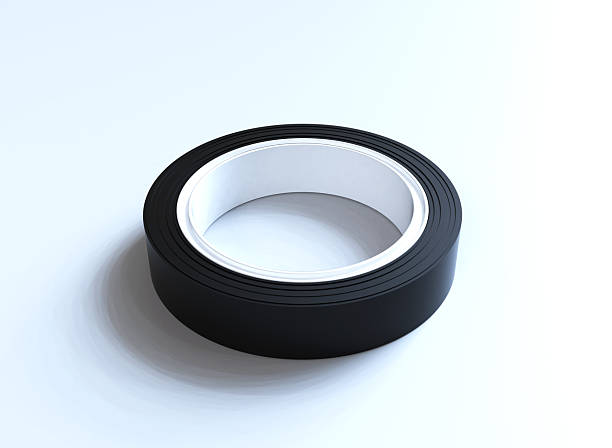 Brown Packaging Tape Roll Standing Upright On A Clean White Background, Showing Adhesive Material Used For Sealing Boxes, Shipping, Storage, And Various Household Or Industrial Tasks.