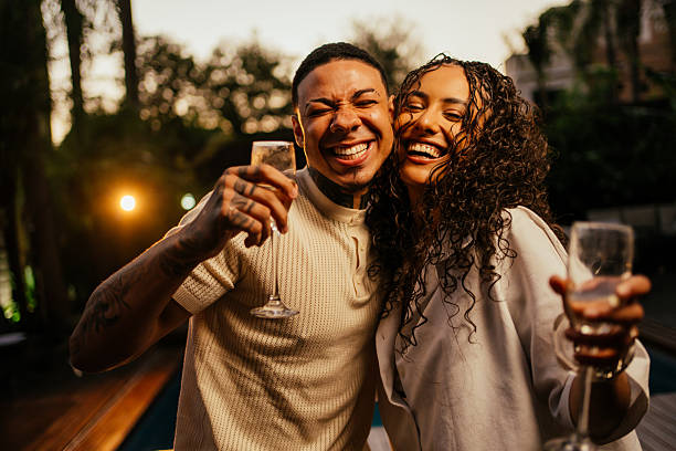 istock Two friends celebrating the new year. 2253411805