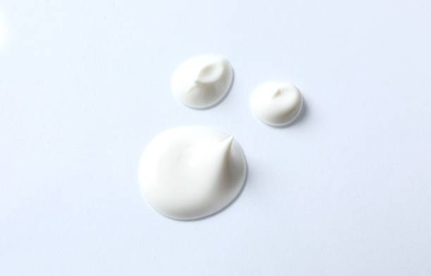 istock Smear of cream on white background 2253413930