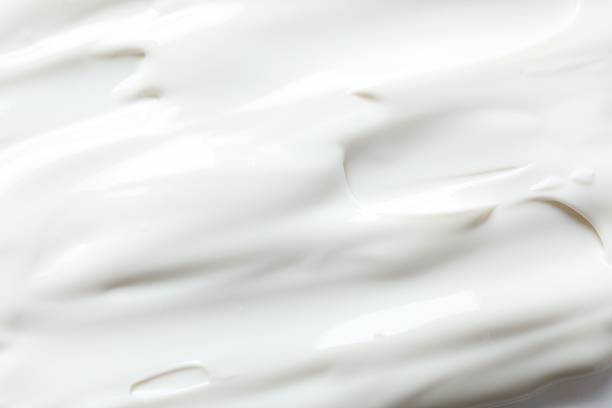 istock White cream as a background. close up 2253413941