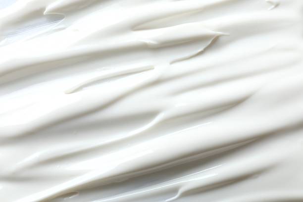 istock White cream as a background. close up 2253413954