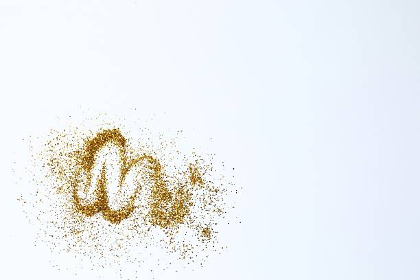 istock Beautiful shiny gold glitter on white background, top view 2253414492