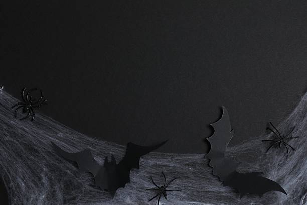 A lot of bats flaying in the evening sky to search for food.Picture is toned.