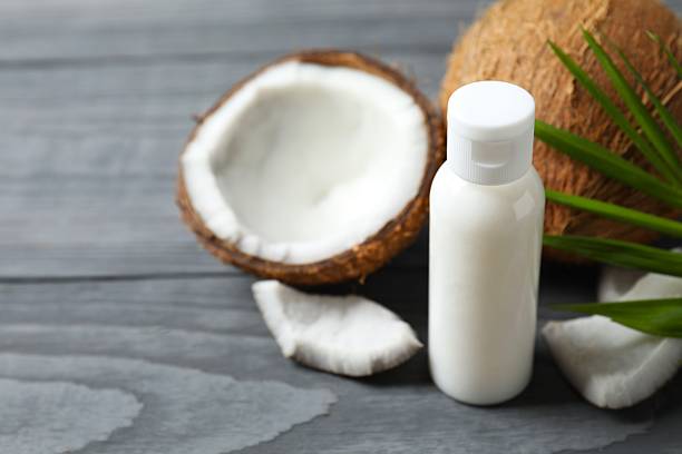 istock Bottle of coconut oil on the table 2253415515