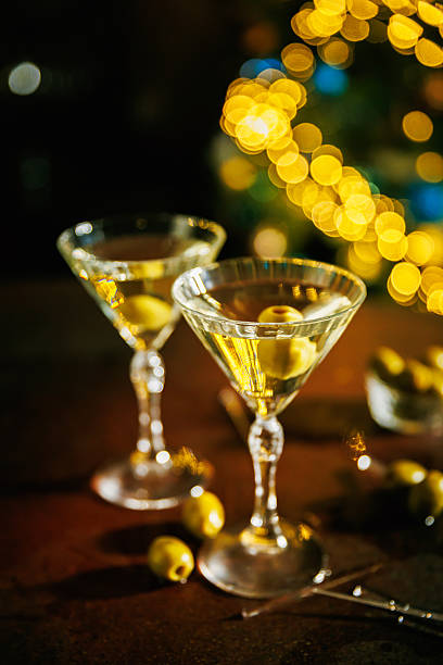 istock Martini with olives against festive lights 2253426900