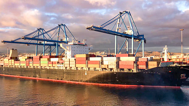 istock View of a container ship in port undergoing loading for international trade 2253426932