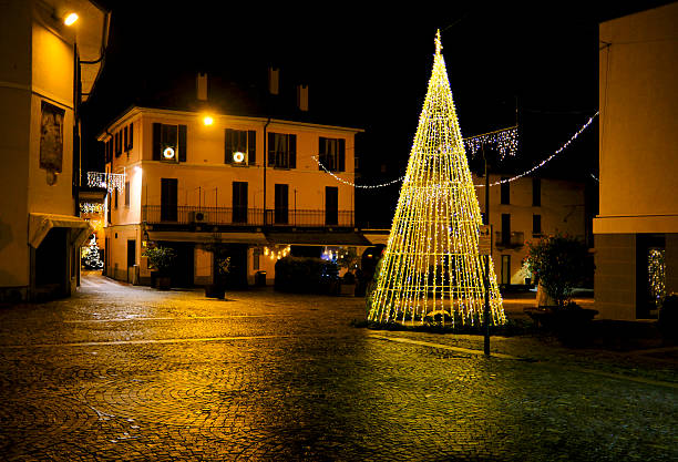 istock Christmas lights in small town square at night 2253429428