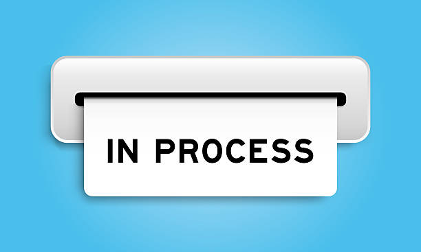 istock White coupon banner with word in process from machine on blue color background 2253434626
