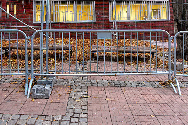 istock Metal fence street constructions 2253435610