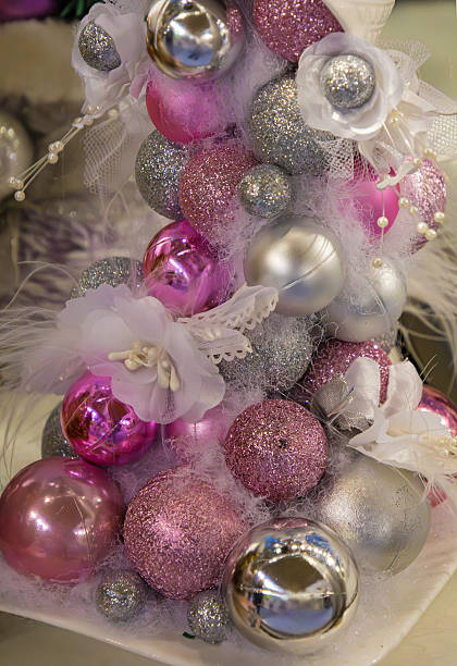 Shiny sparkling pink festive Christmas ornaments pattern background