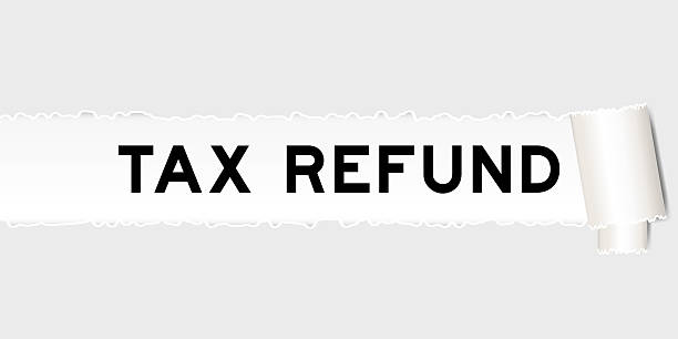 istock Ripped gray paper background that have word tax refund under torn part 2253437799