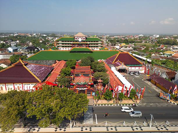 Tuban, East Java, Indonesia - July 11, 2025: Coast line at downtown Tuban, in front of Kwan Sing Bio temple
