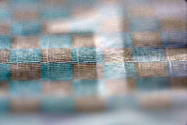 A close-up view of a soft textile featuring a unique blue and brown checkered pattern, perfect for showcasing textures and design elements in various creative projects.