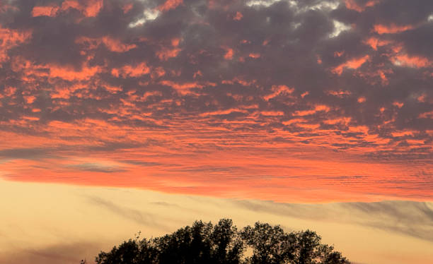 istock Sunset paints the sky with vibrant colors, casting shadows and creating a beautiful scene 2253442672